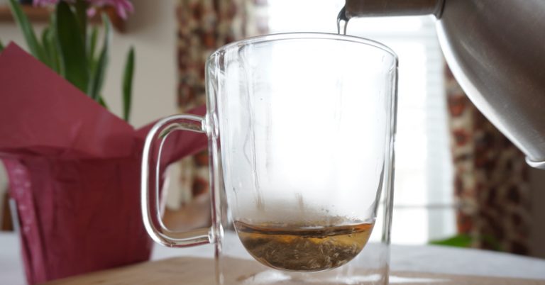 10 Benefits to Drinking Warm Water (No Lemon Required) - Featured image