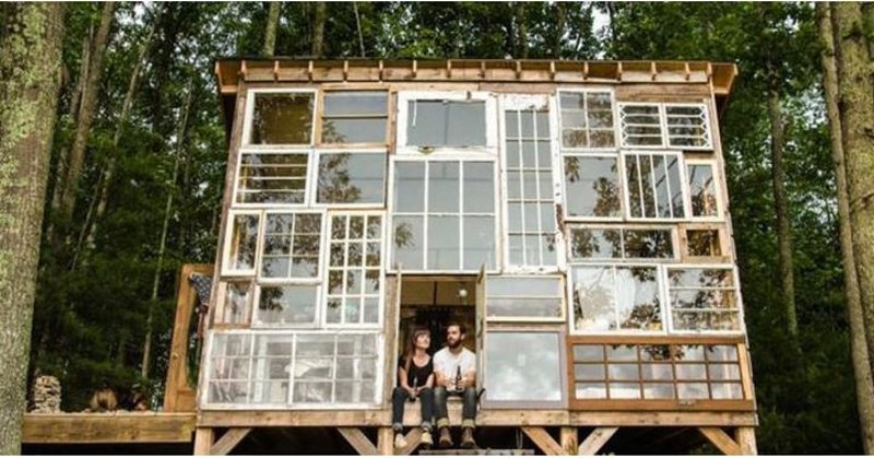 This artist couple build an incredible cabin out of recycled windows for under $500