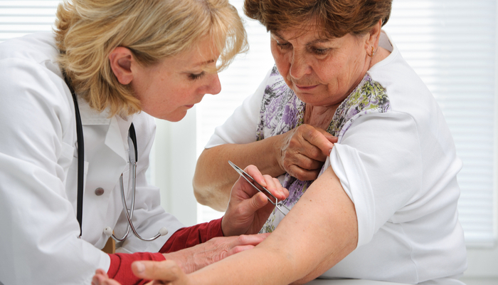 Doctor examining a woman.