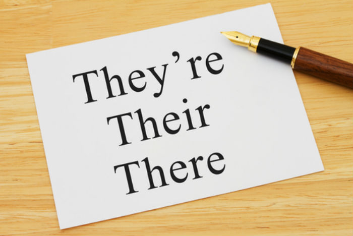 They're, Their and There written on a white piece of paper