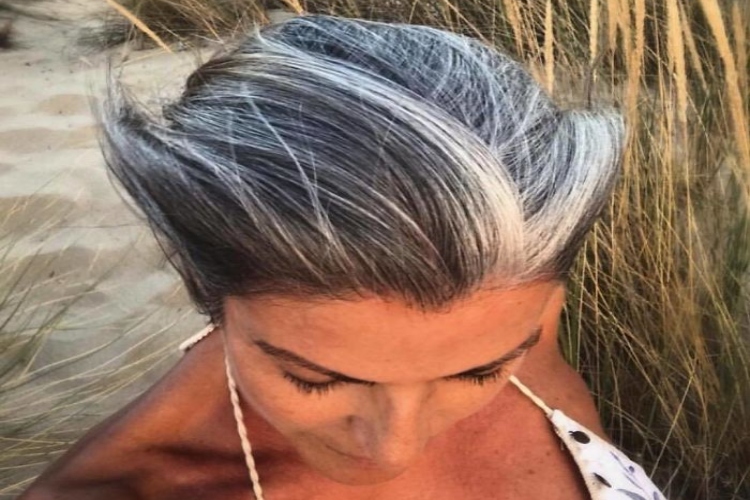 Top view of a woman's long black and white hair