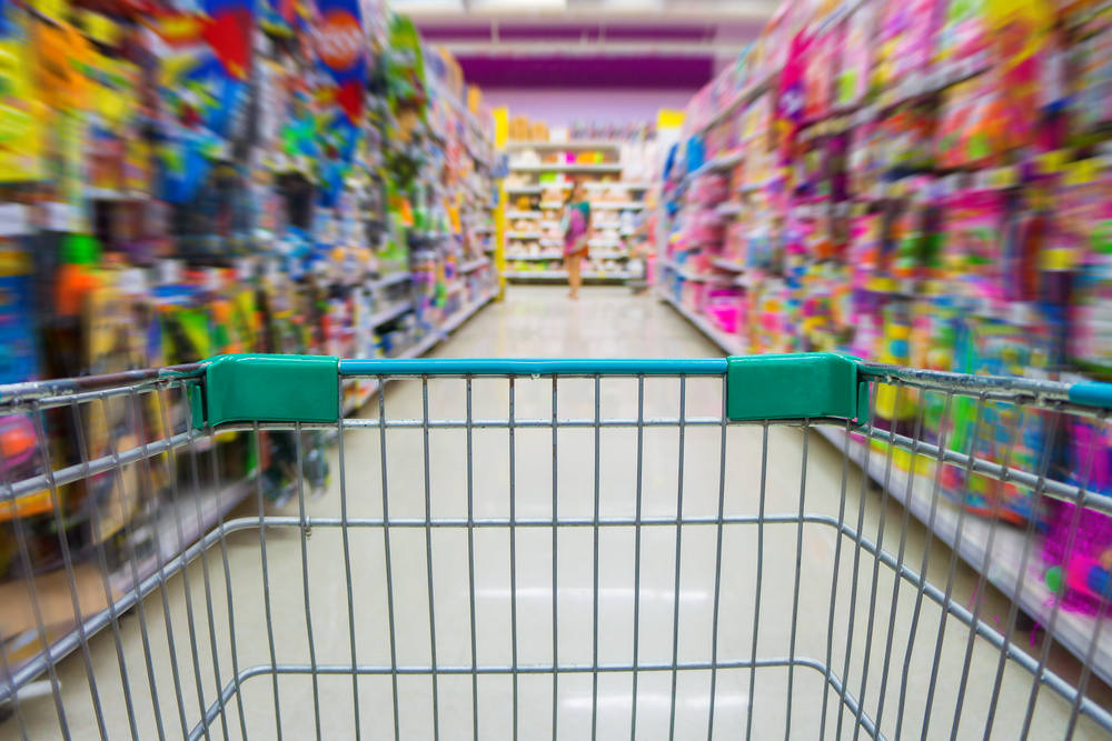Shopping cart in toys department store
