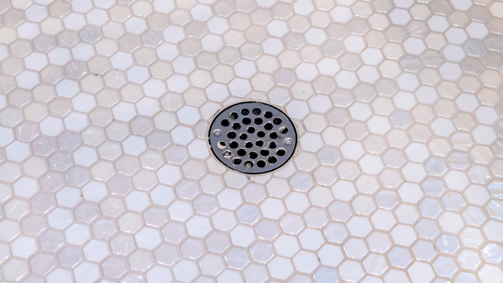 Panorama Drain plug in a shower cubicle floor
