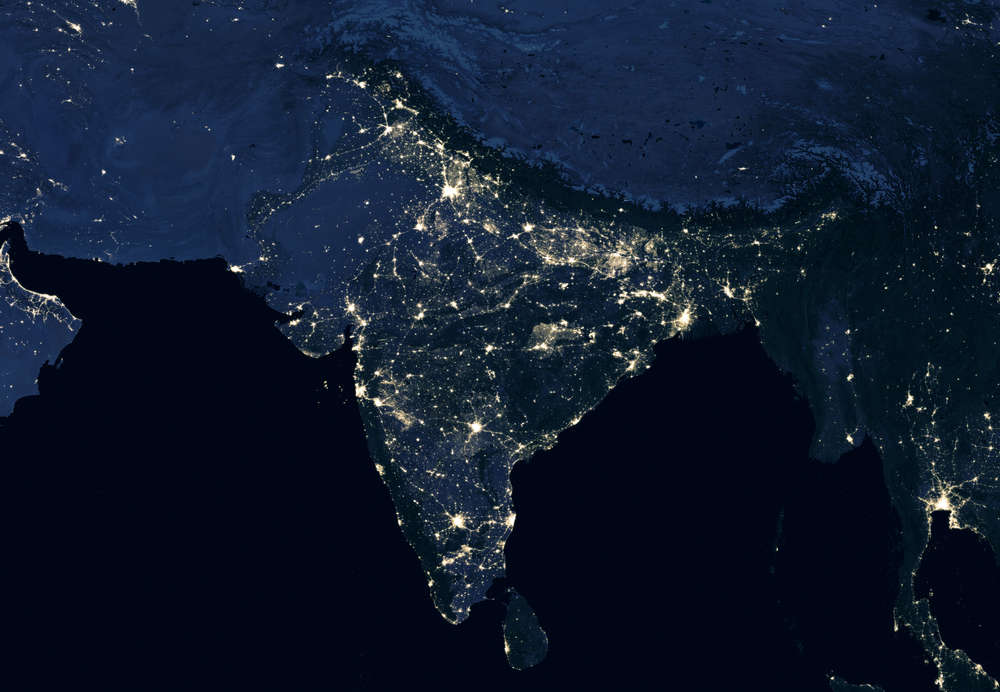 India at night, view of city lights showing human activity in India from space. Part of South Asia on world dark map in global satellite picture. Tech theme. Elements of this image furnished by NASA.