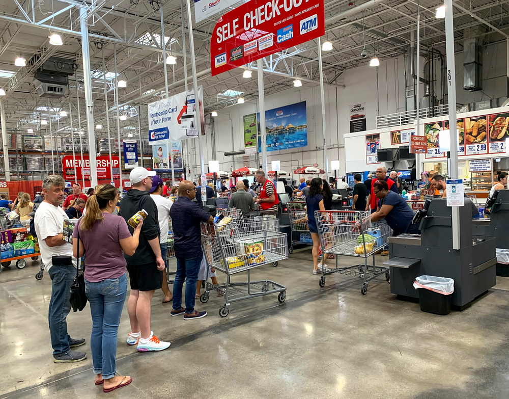 DAVIE, FLORIDA, USA: Customers standing on line to check out of Costco. Costco is an American corporation that operates a chain of members only warehouse clubs as seen on October 26, 2019.