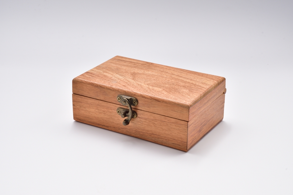 closed wooden box.empty wooden box white background.wooden box isolated white background.wood box.Wood chest of jewelry.Thai handmade wood chest.