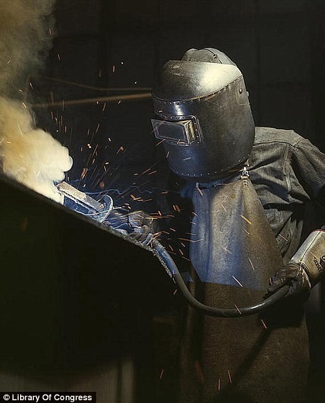 June 1942: A welder created a boiler for a ship at the Combustion Engineering Company in Chattanooga, Tennessee
