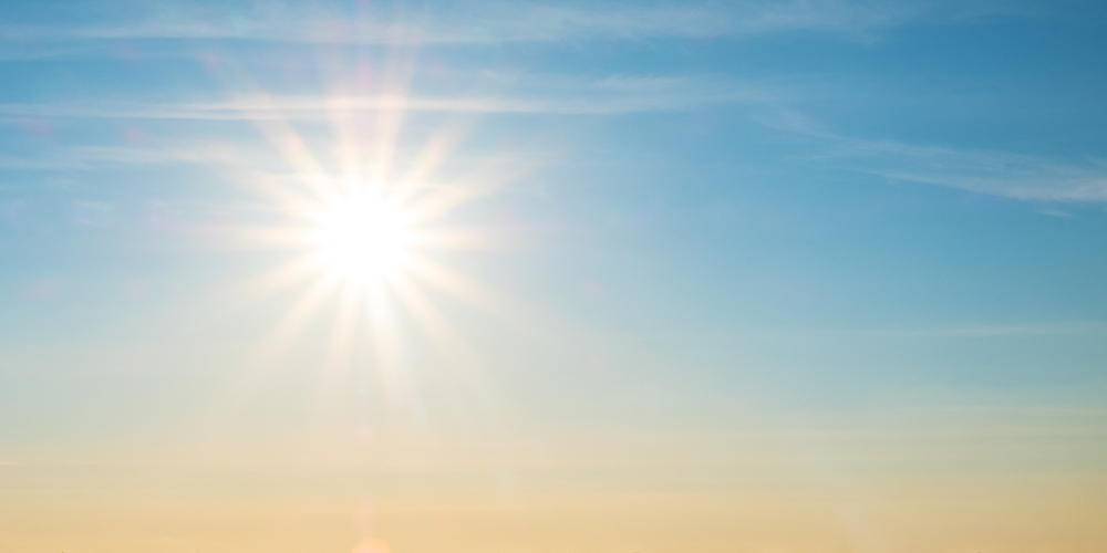 beautiful setting sun and blue sky with copy space.