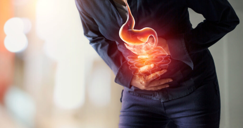 Woman touching stomach painful suffering from stomachache