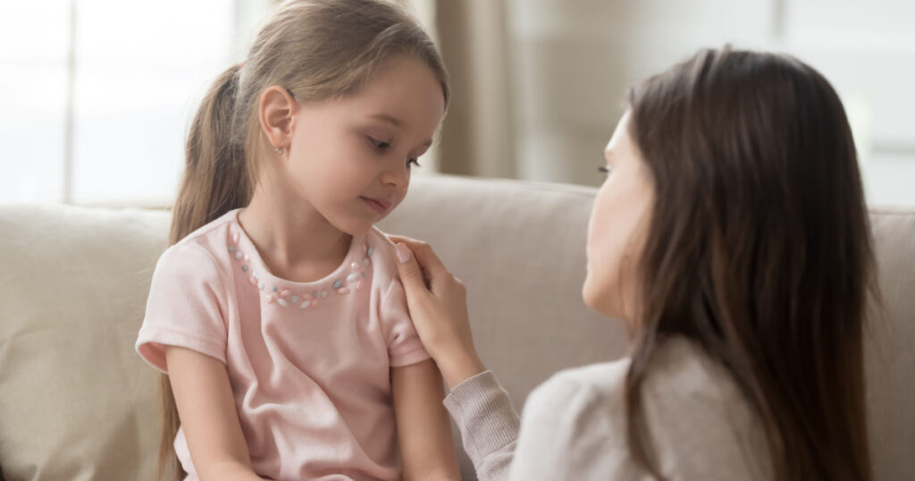 Loving worried mom psychologist consoling counseling talking to upset little child girl showing care give love support, single parent mother comforting sad small sullen kid daughter feeling offended