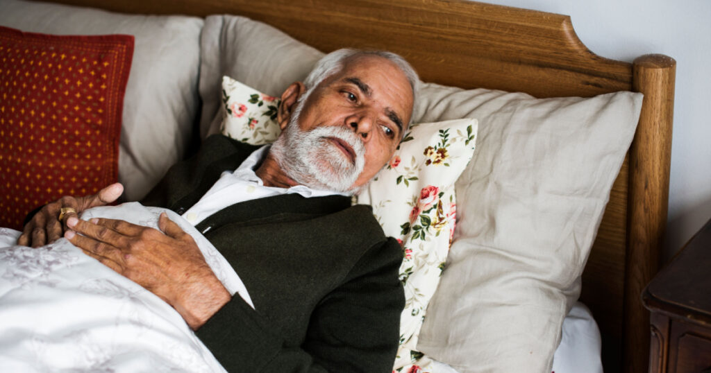 old man in bed
