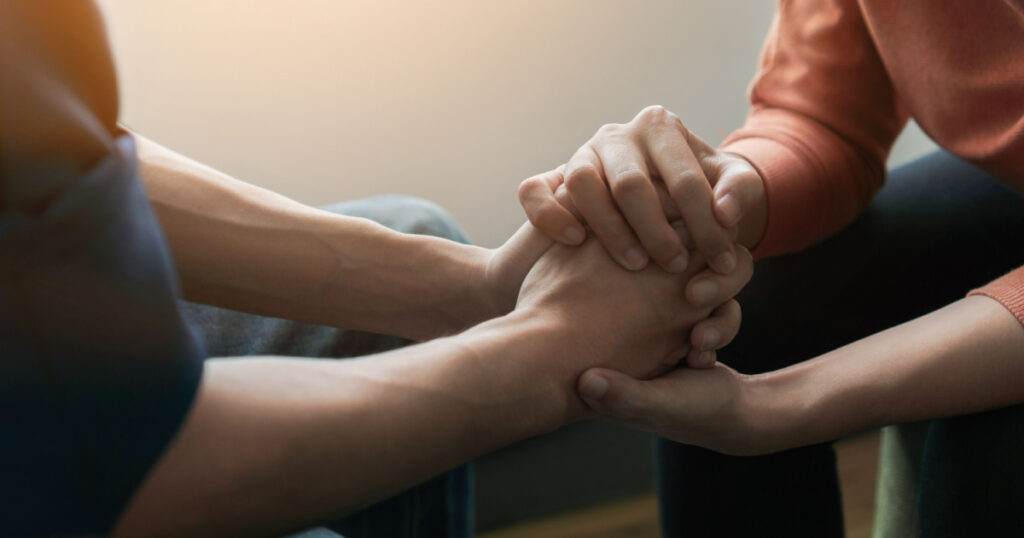 couple holding hands