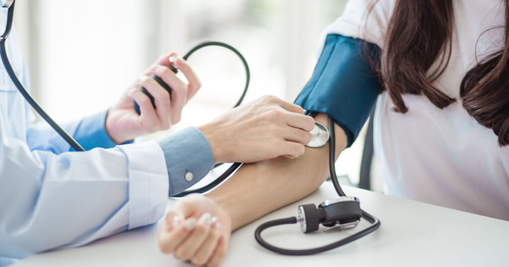 taking blood pressure