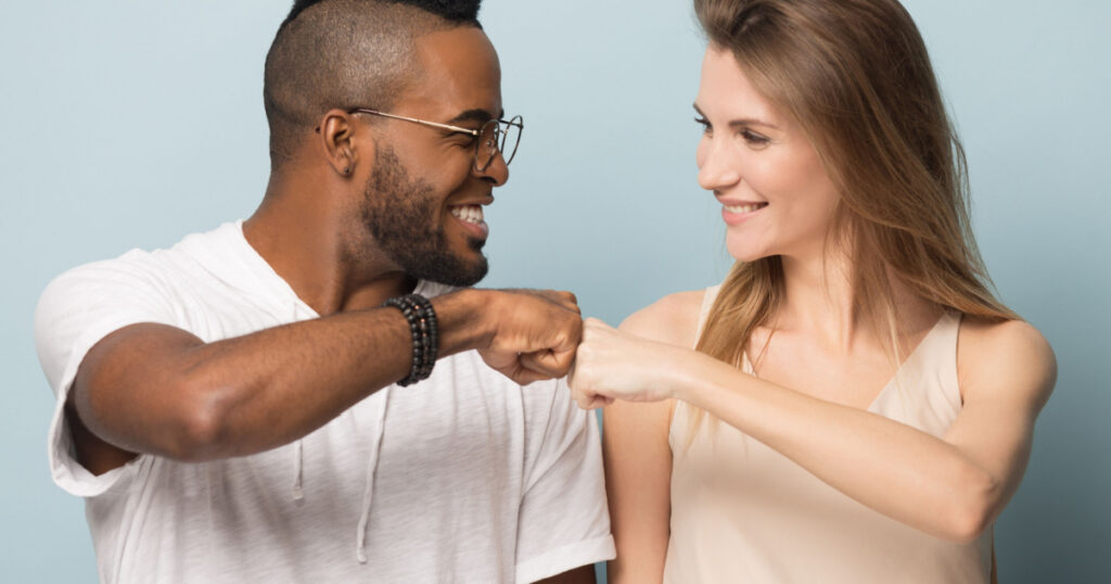 couple fist bump