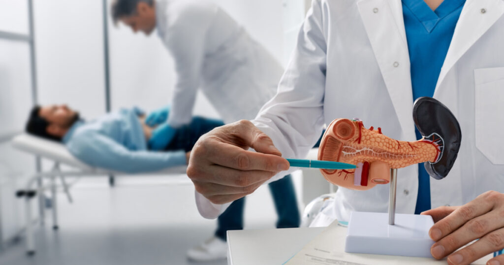 Doctor palpates man patient abdomen and examines belly in medical clinic to analyze condition of pancreas. Treatment of pancreatic diseases, acute and chronic pancreatitis
