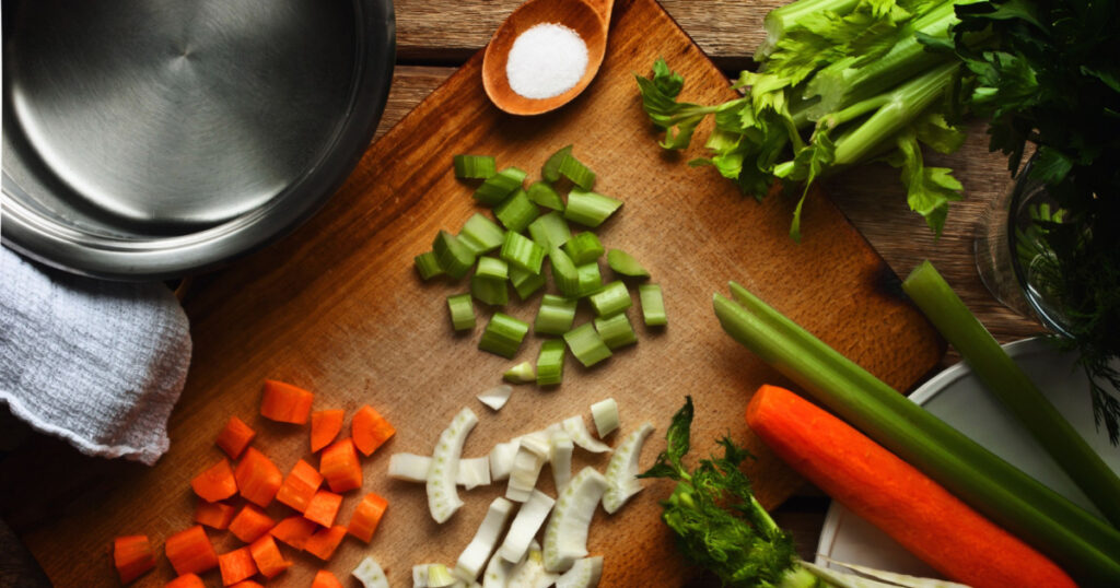 Ingredients for the vegetable broth on the wooden table