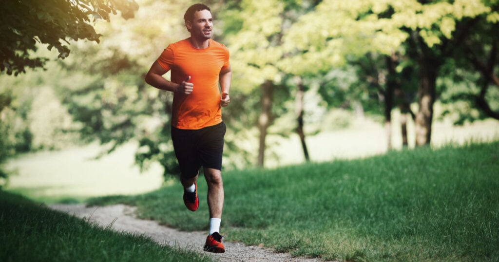 Active healthy runner jogging outdoor
