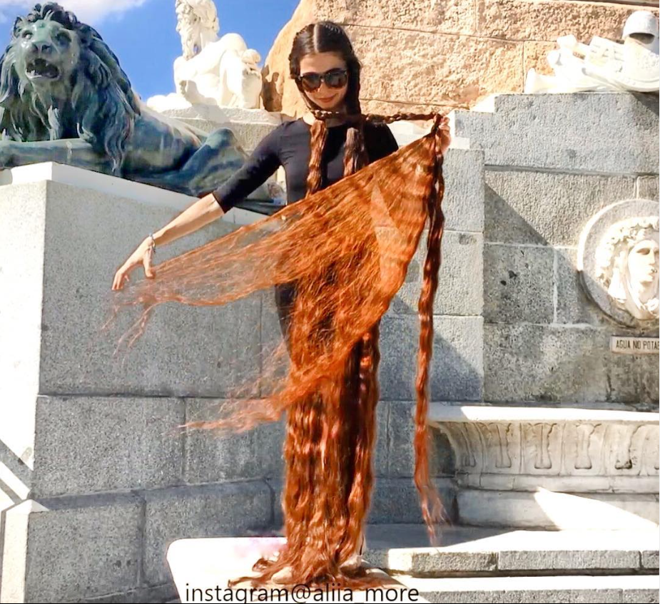 Aliia Nasroya long-haired woman