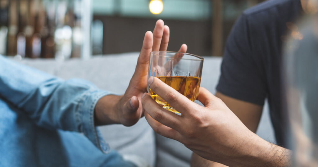 Stop alcohol concept. Person refuse to drink alcohol.
