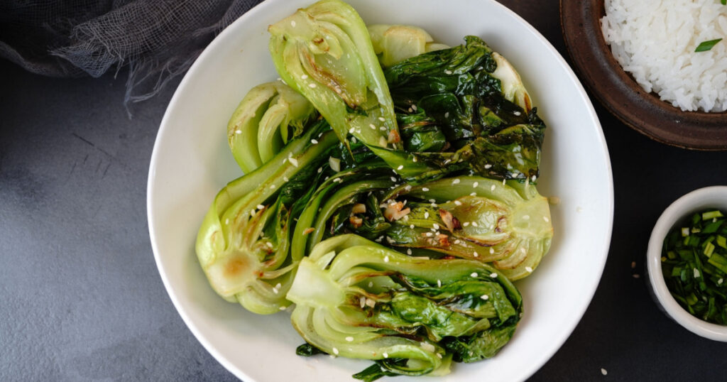 Asian Bok Choy stir fy with garlic and sesame seeds, selective focus
