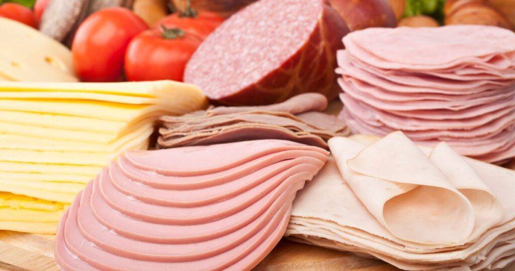 big group of meat, bread and vegetables
