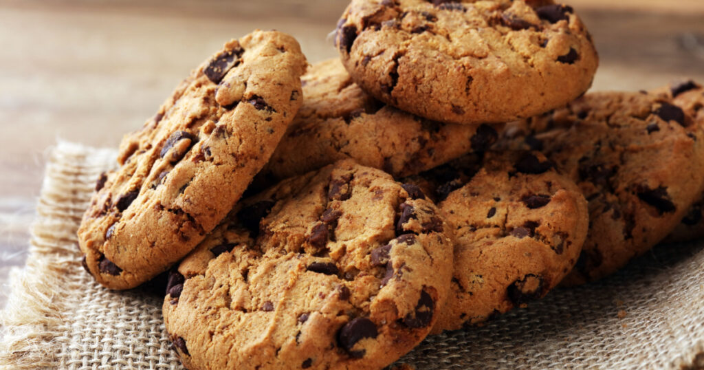 Chocolate cookies on wooden table.
