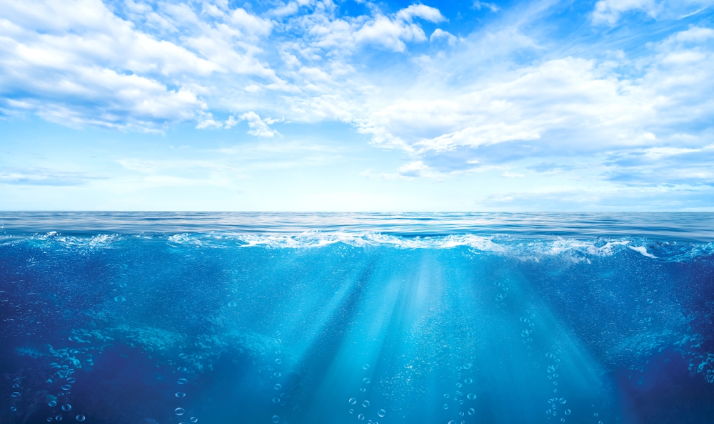 BLUE UNDER WATER waves and bubbles. Deep sea
