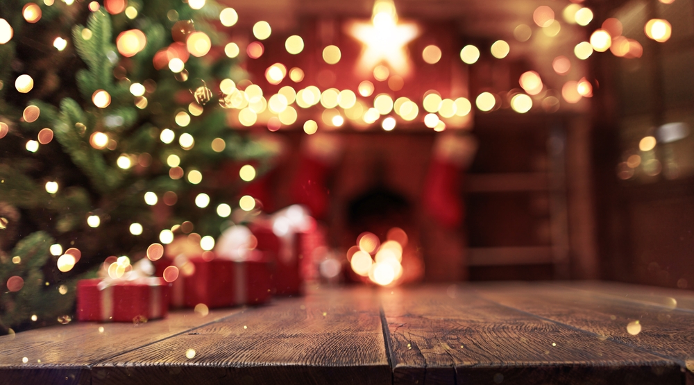 Wooden background with glitter effects and fireplace