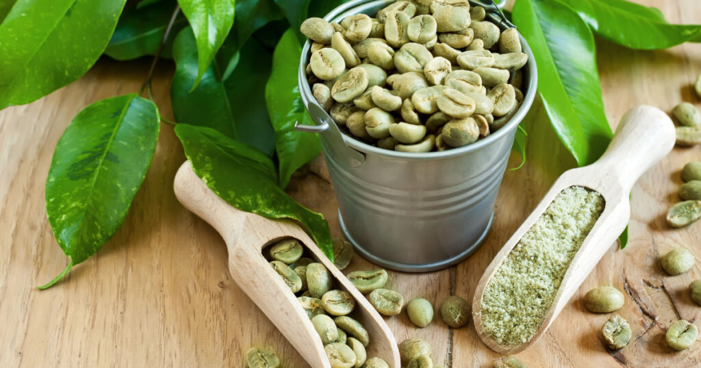 Green coffee - beans and ground. Selective focus.

