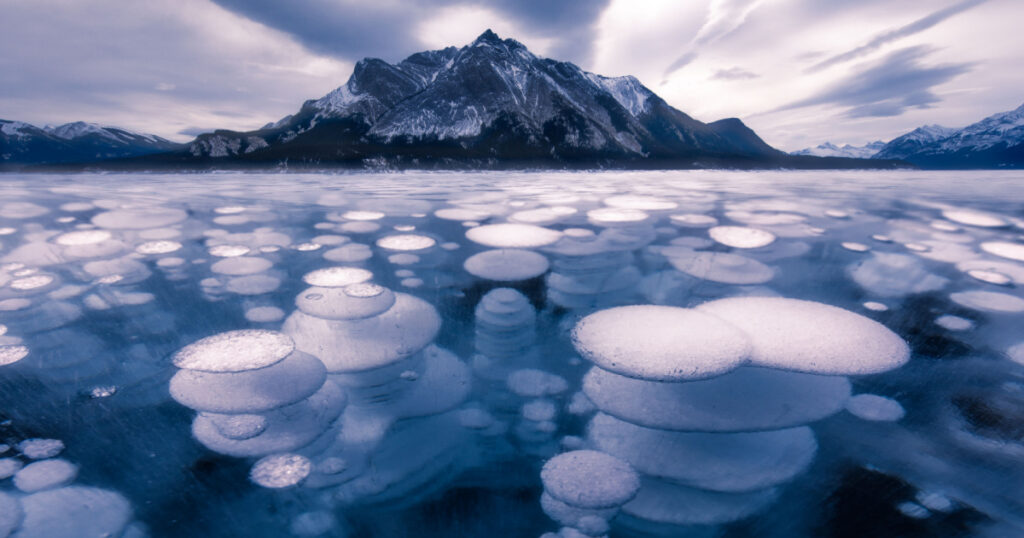 Abraham lake winter ice formation bubbles