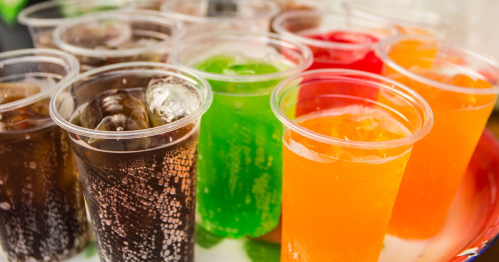 Soft drinks in plastic cups with Ice cool