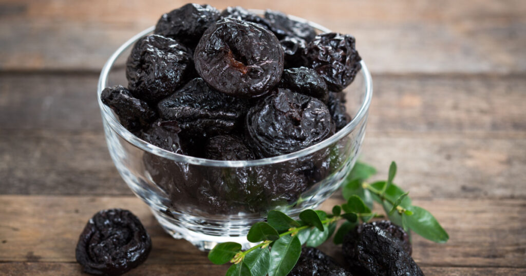 Dried plums - prunes in the bowl