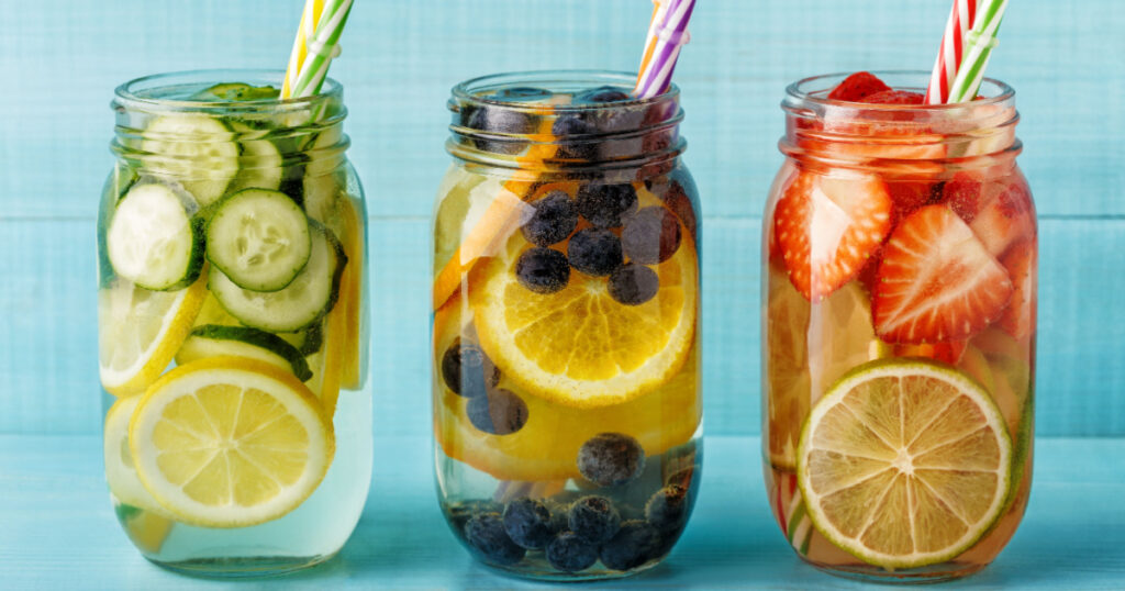 Detox fruit infused water. Refreshing summer homemade cocktail, selective focus.
