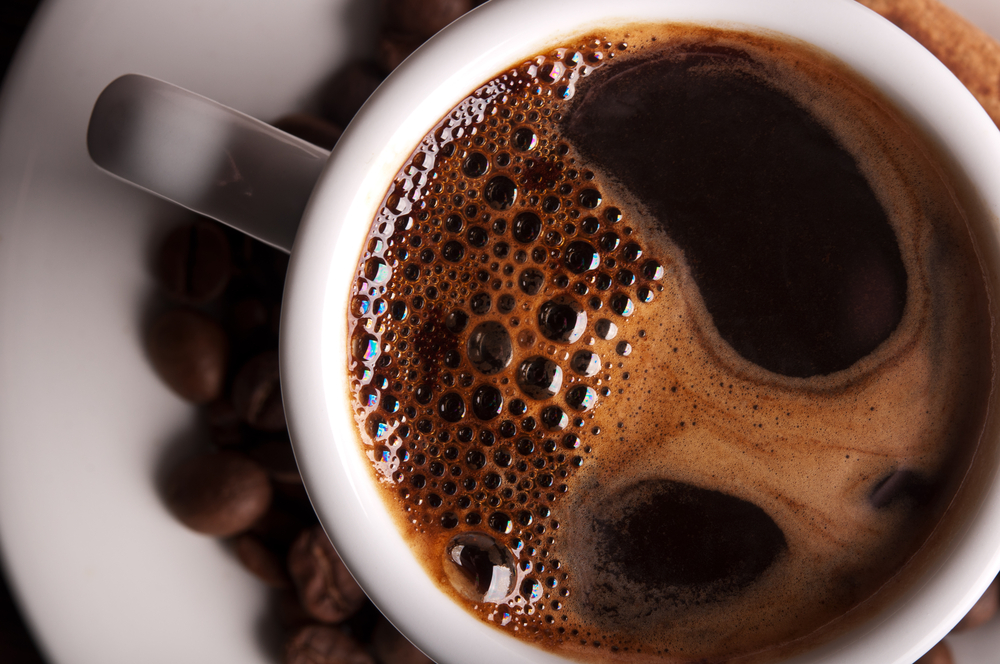 white coffee cup on background
