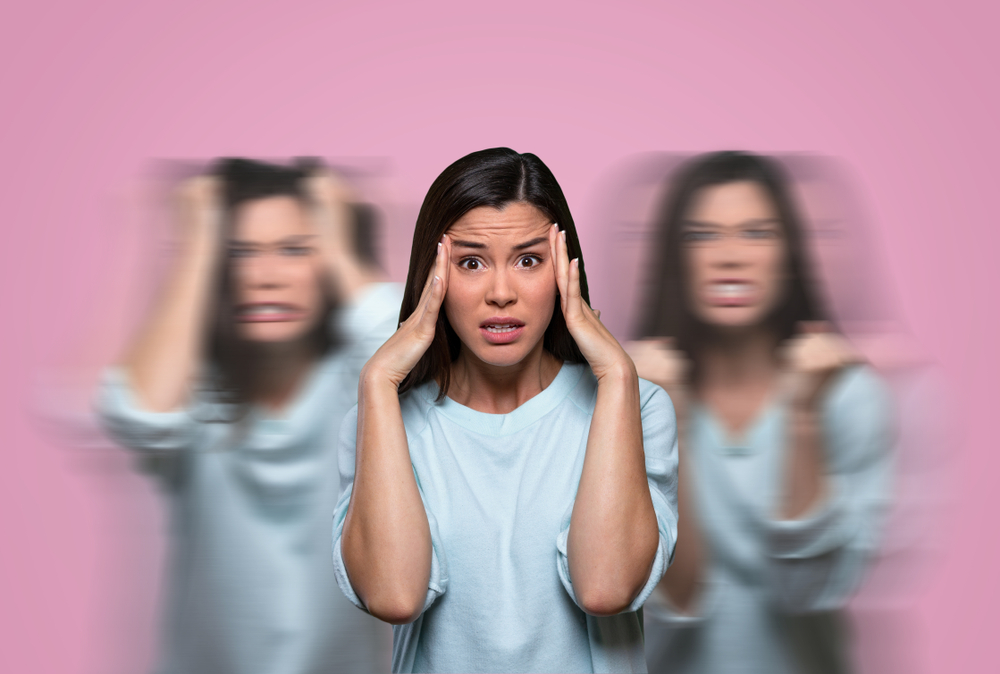 Woman suffering from female hormonal emotional pain, mental anguish and imbalance, depression, anger, and uncontrollable mood swings
