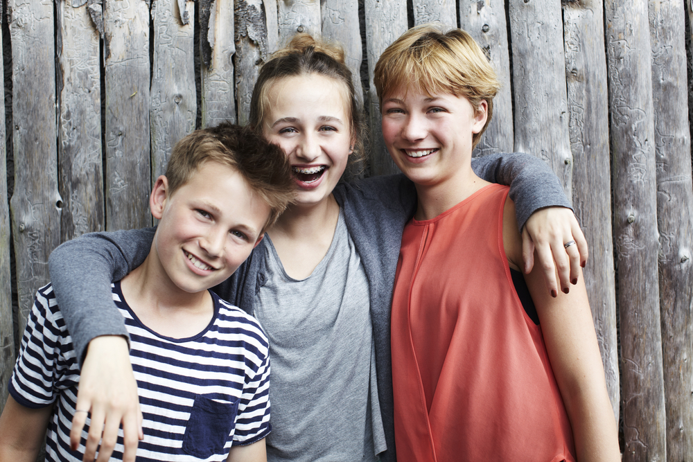 Portrait of three siblings