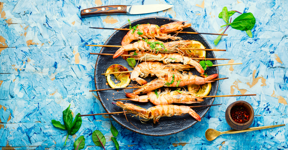 Grilled langoustines,prawn roasted on a skewer.Grilled seafood plate