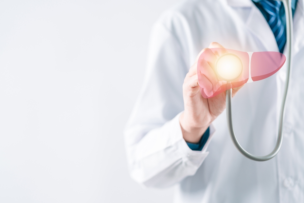 doctor in a white coat check up liver organ virtual icon, hepatitis vaccination, liver cancer treatment. Health checkup concept.
