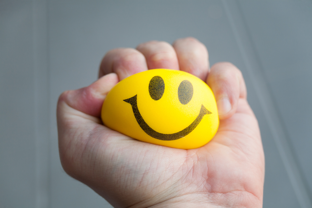 squeezing stress ball