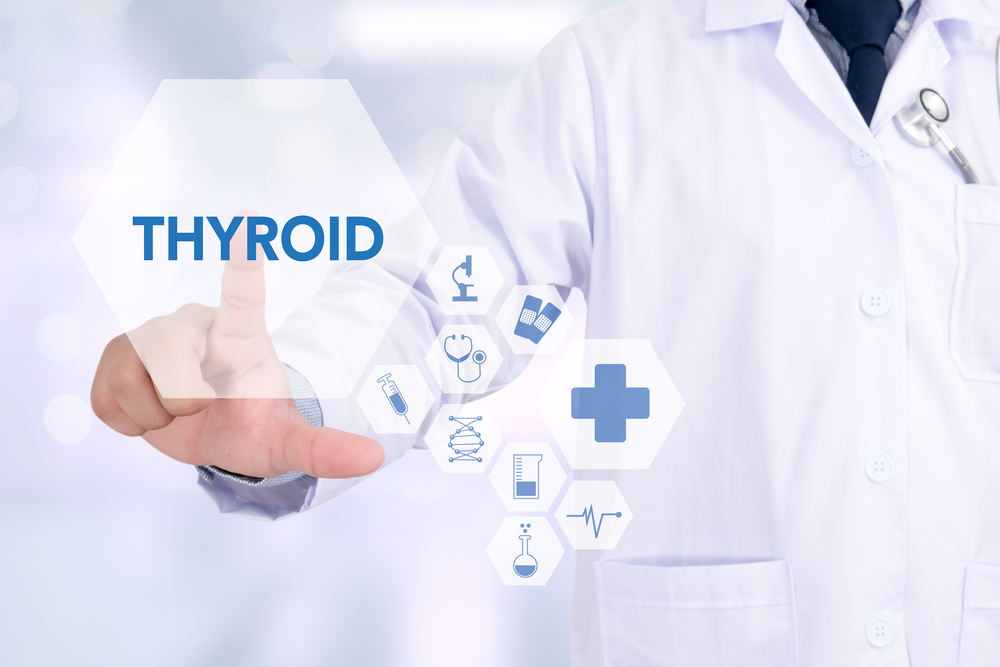 THYROID Medicine doctor working with computer interface as medical