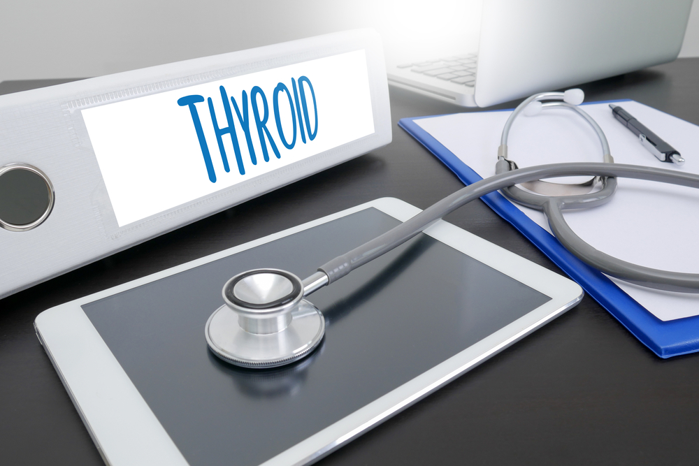 THYROID gland and trachea scheme shown , Health care and medical concept , throat pain