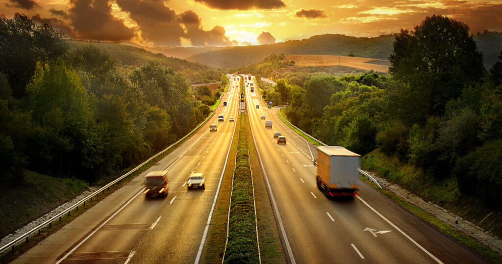 Highway traffic in sunset
