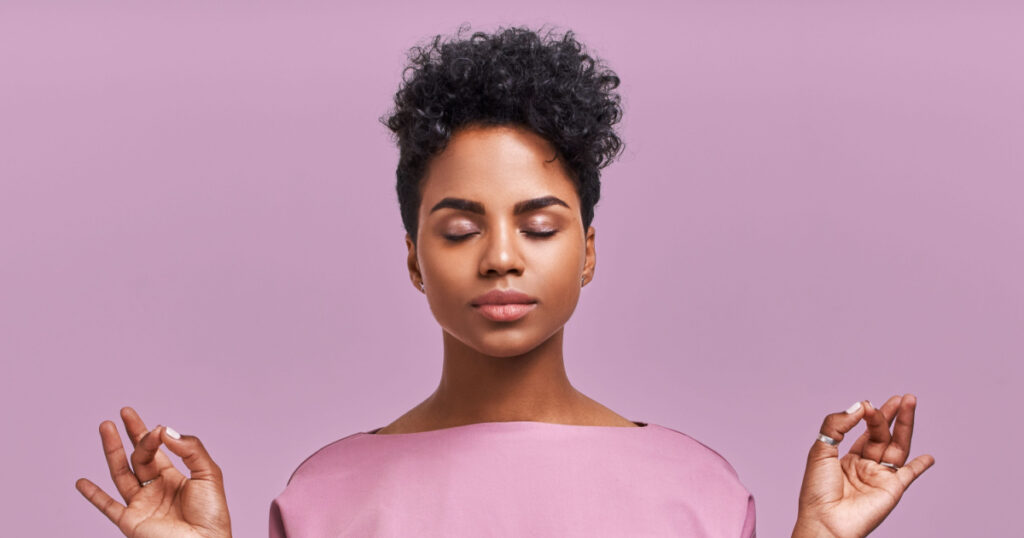 Calm woman relaxing meditating, no stress free relief at work concept, mindful peaceful young businesswoman or student practicing breathing yoga exercises on isolated over lavender background