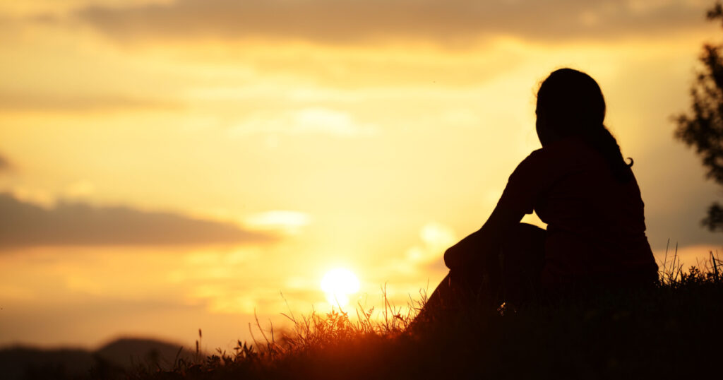 Girl spending happy time on summer nature