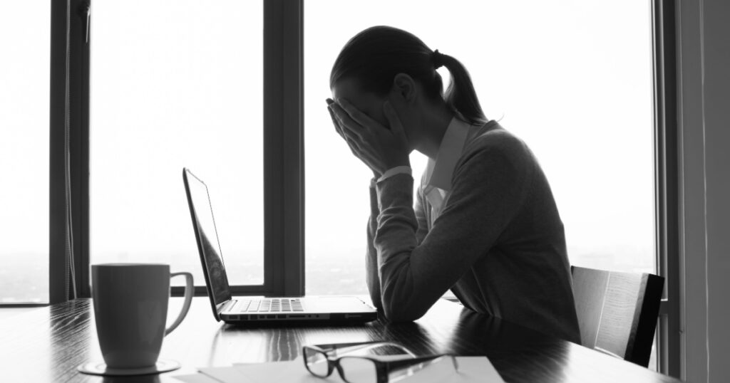 Depressed woman in the office