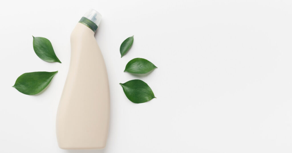 Save the environment with using Eco Cleaning detergents, no SLS, bottle with mockup for label, white background, copy space