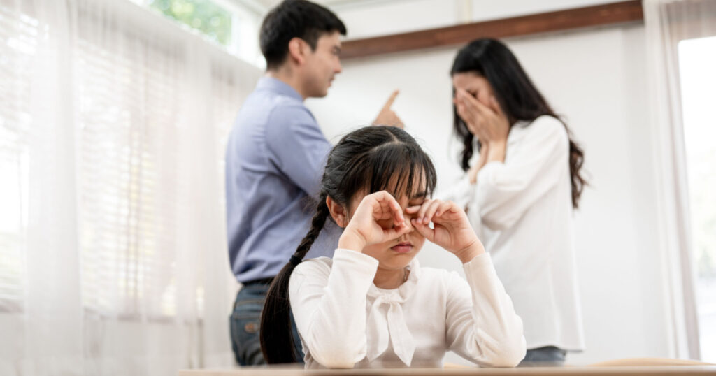 Children with symptoms of stress, sadness because his father and mother, they were quarreling violently. Violence in the home. Parent toxic in home, psychology, kinds problem concept.