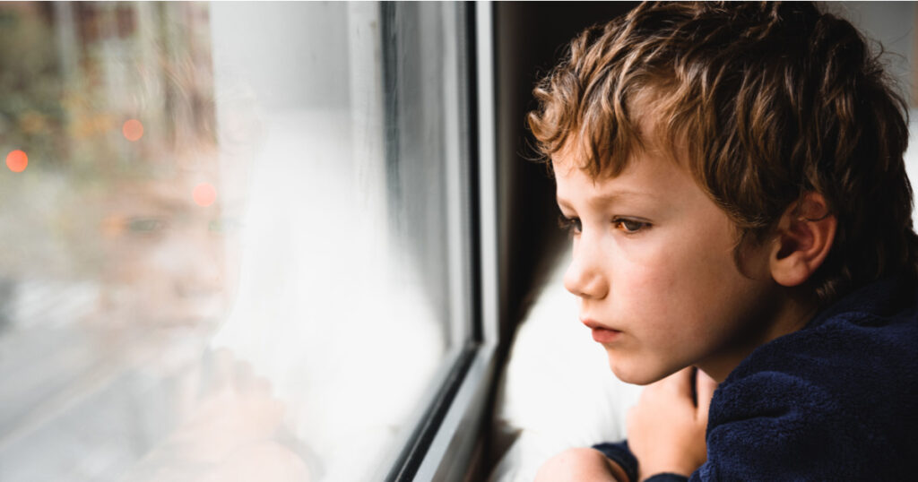 Boy stays home bored by school closings due to covid pandemic.