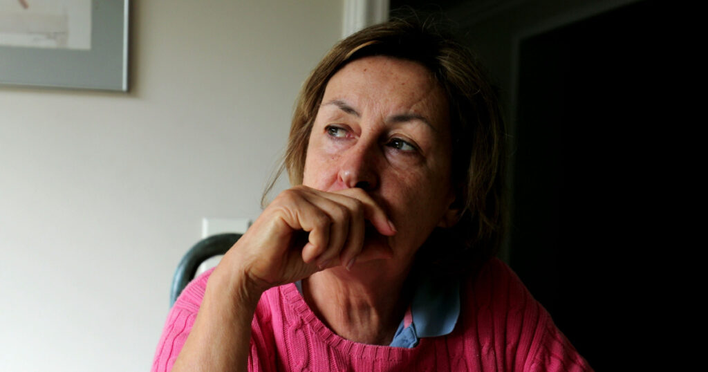 Pensive older woman thinking deeply. Contemplative senior person