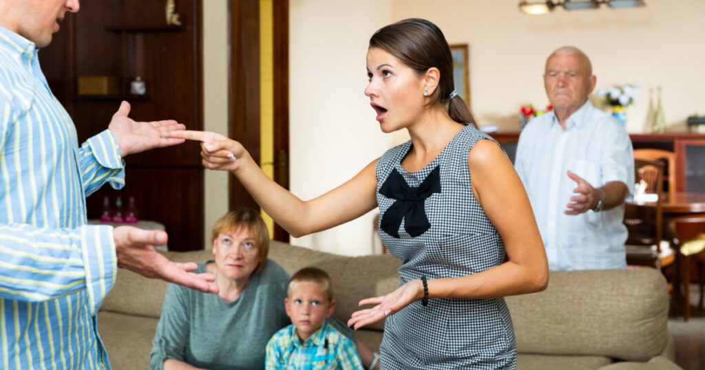 Quarrel between husband and wife in a large family. High quality photo